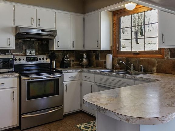 5th image of 8767 Wonderland Ave NW