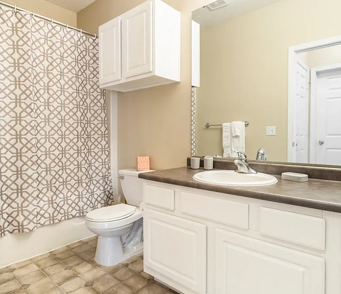 Enjoy the convenience of a spacious vanity, built-in storage, and plenty of lighting.