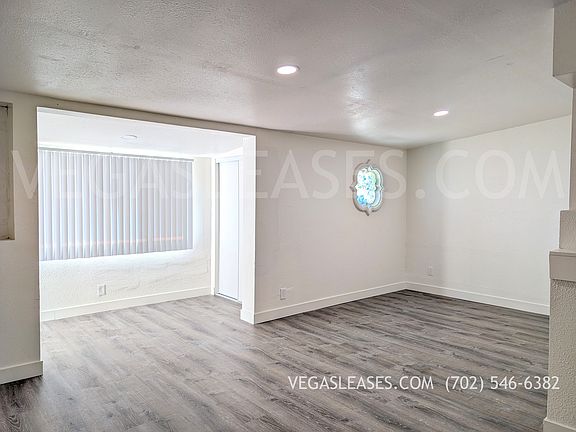 Living room view facing the entryway
