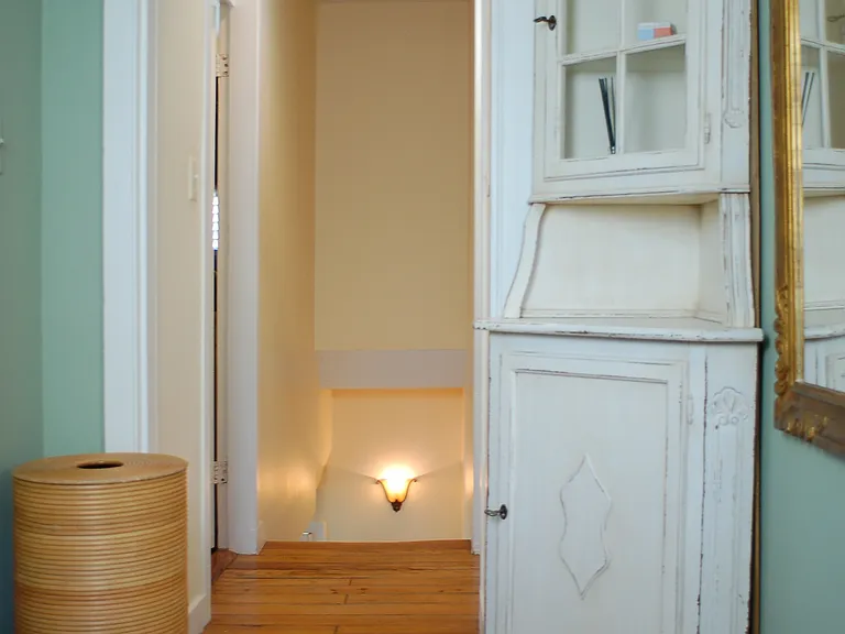 upstairs hallway w/ built-in corner hutch