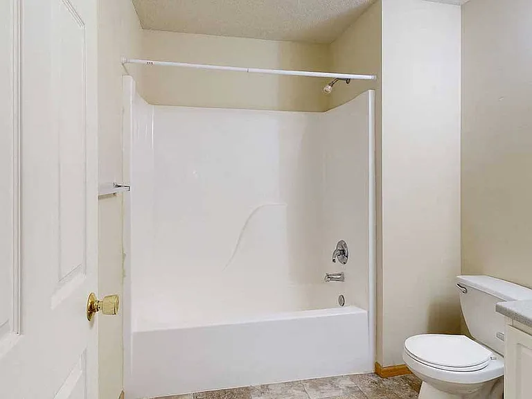 Our bathrooms feature a full-size tub and shower, perfect for relaxing and refreshing.