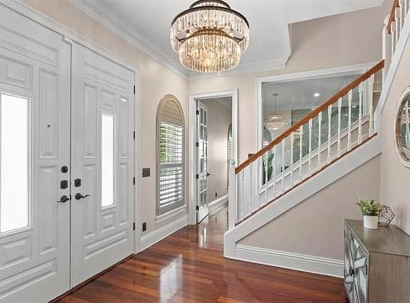 Foyer with dual entry staircase
