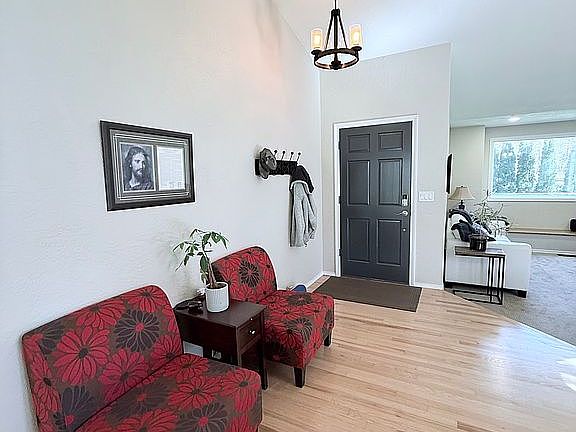 Entry with vaulted ceiling. 