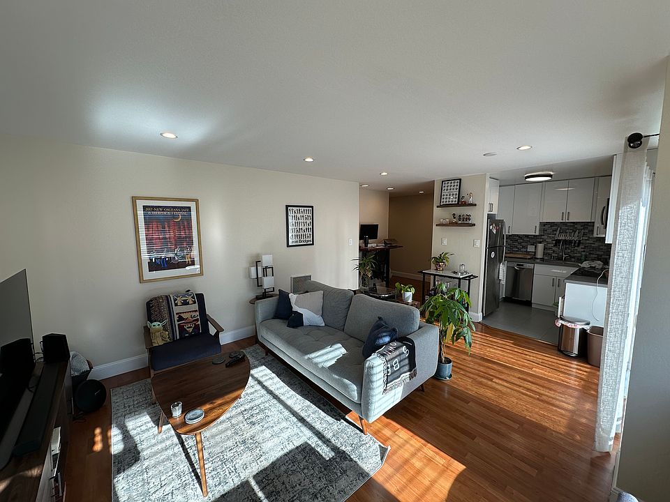 South facing living and dining room with lots of sunlight and recessed lighting