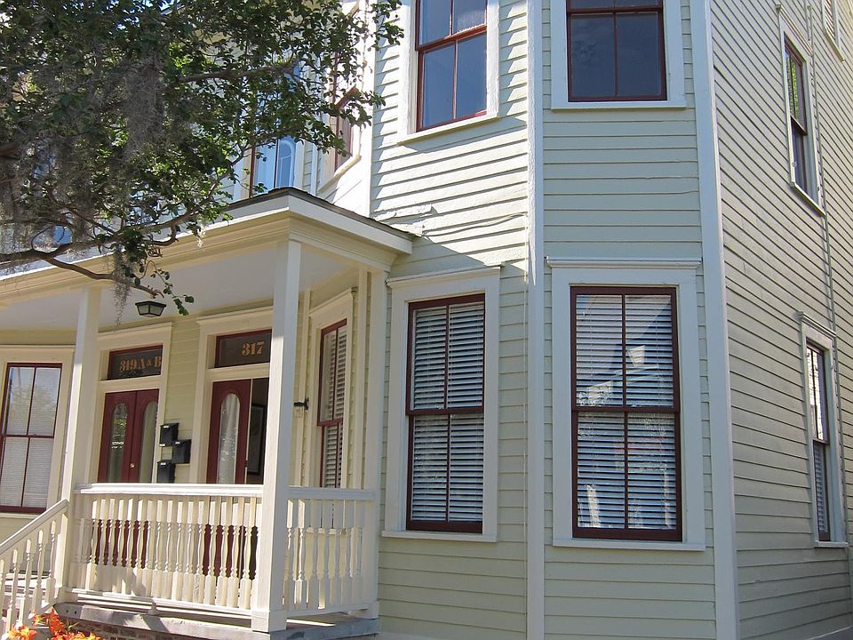Front of house - door on left is to apartment