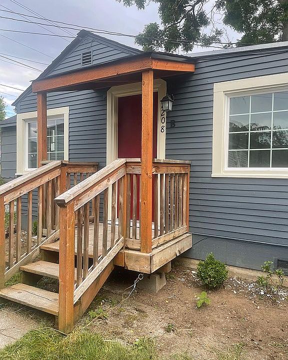 The front of the house, bark will be added to the beds.
