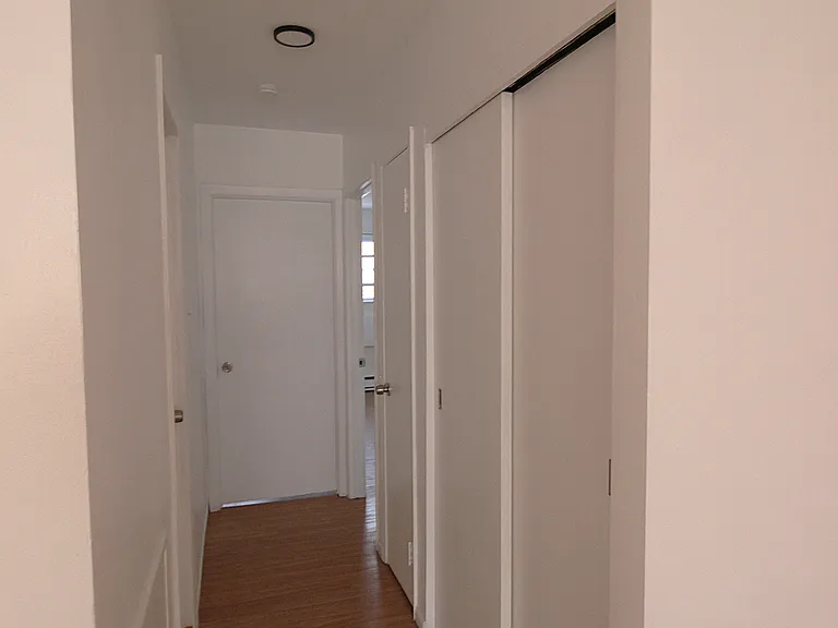 Hallway with two closets