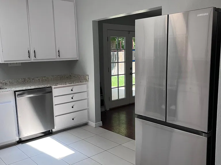 brand new kitchen appliances and tile floor! very bright room with natural light from skylight!