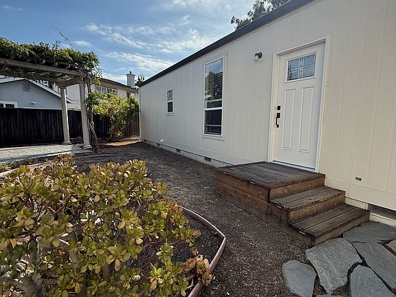 front entrance to the guest house. zero maintenance yard.