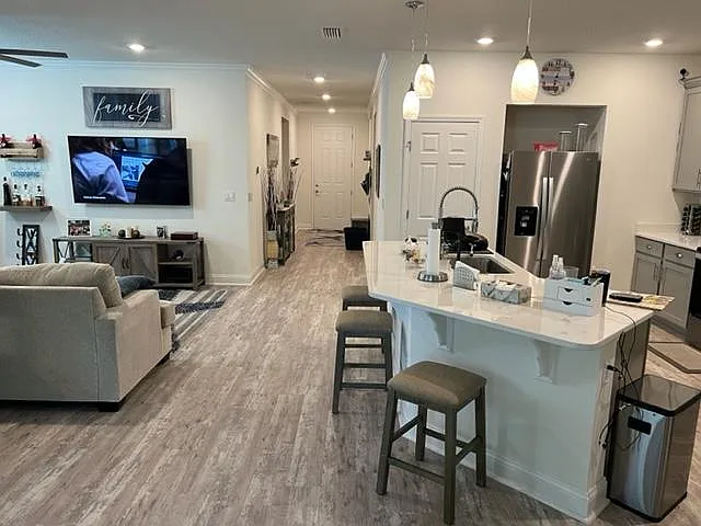 Open concept kitchen, dining and family area allows for plenty of space to move around comfortably.