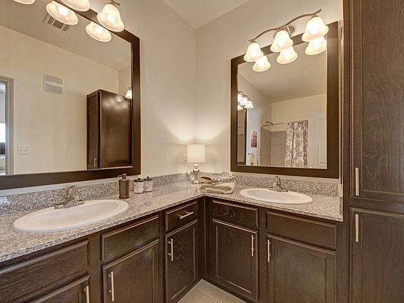 Double Vanities and Granite Countertops in the Master Bathroom