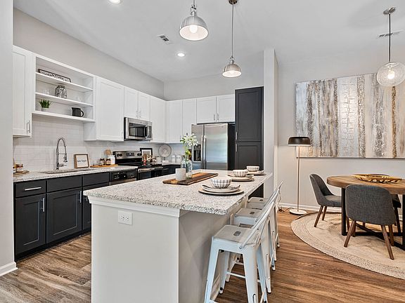 Kitchen with Spacious Breakfast Bar at the Newton Apartments in Charlotte, NC