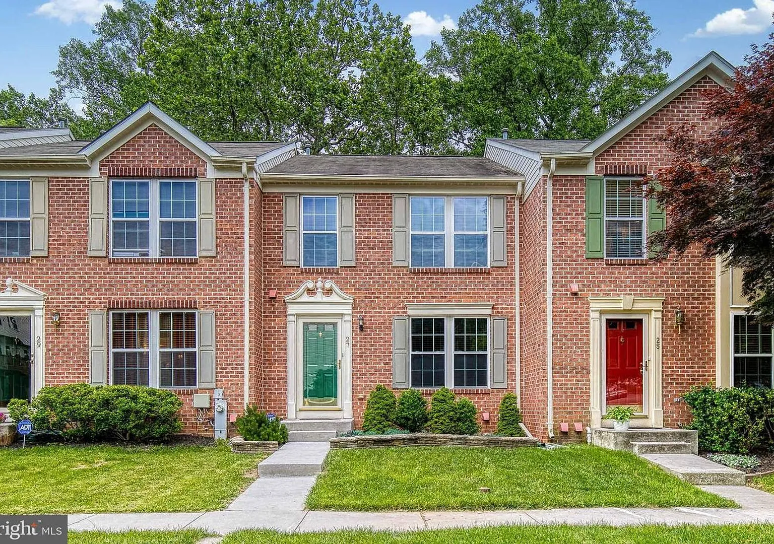Welcome to this beautiful 3bd 2.5bth brick-front townhome in the highly desirable New Town community — Photo 1