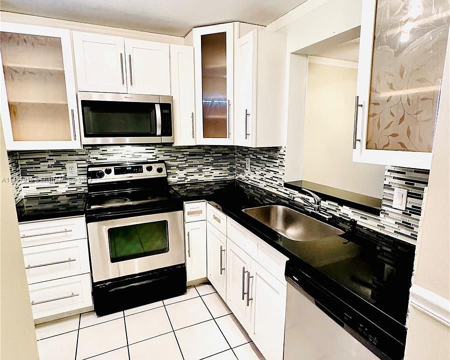 1st image of 8740 N Sherman Cir APT 206