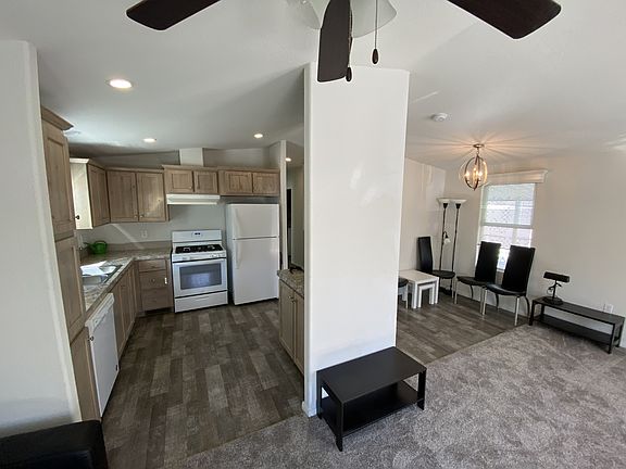 Newer Mobil home. Blocks from the beach. Pool and club house, 2-bedroom 2 baths, semi furnished, washer and dryer,