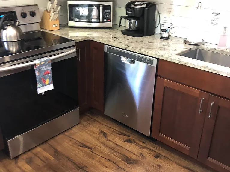 Kitchen with Keurig Coffee Center and Microwave