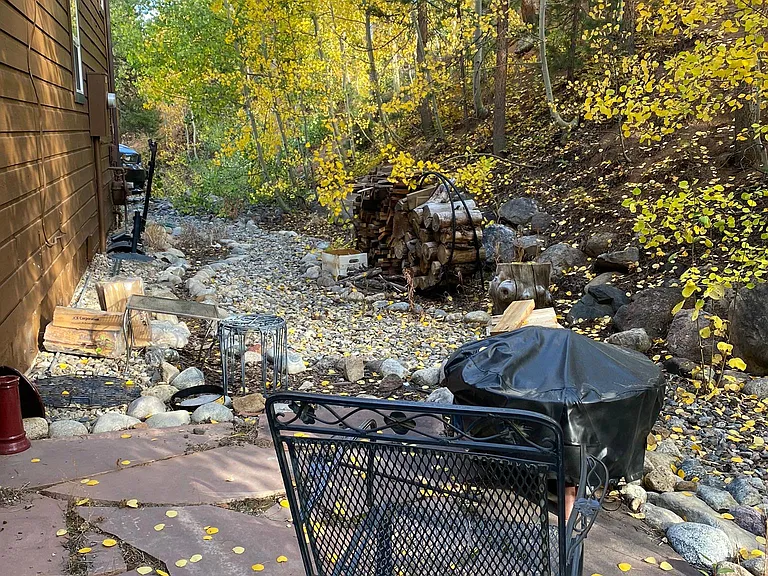 Peaceful backyard backing to open space and trees