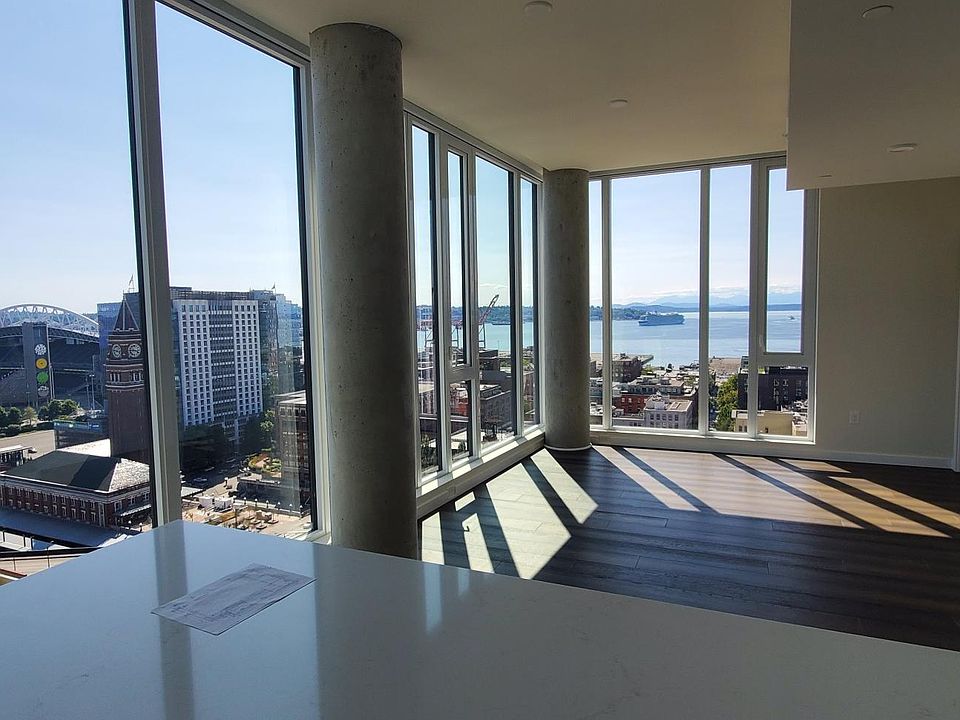 View of actual unit prior to installing Lutron wireless motor shades on all windows.