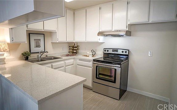 4th image of 6815 Remmet Ave Unit 214