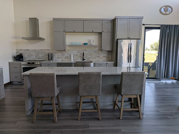 Direct access from Great Room to fenced-in outside patio--direct views of Yanney Park.