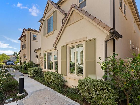 Welcome Home To 219 Primrose in Camden Square's Gated Community of Foothill Ranch!