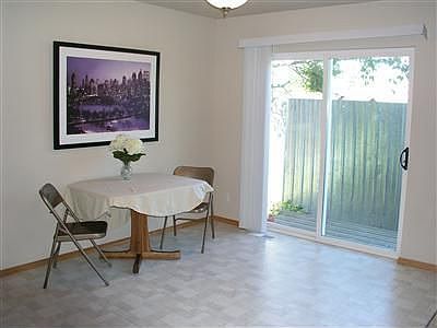 Dining area has sliding glass doors to back yard area. Patio out back is large