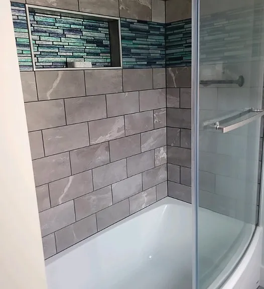 Gorgeous hand-tiled shower in master bath.