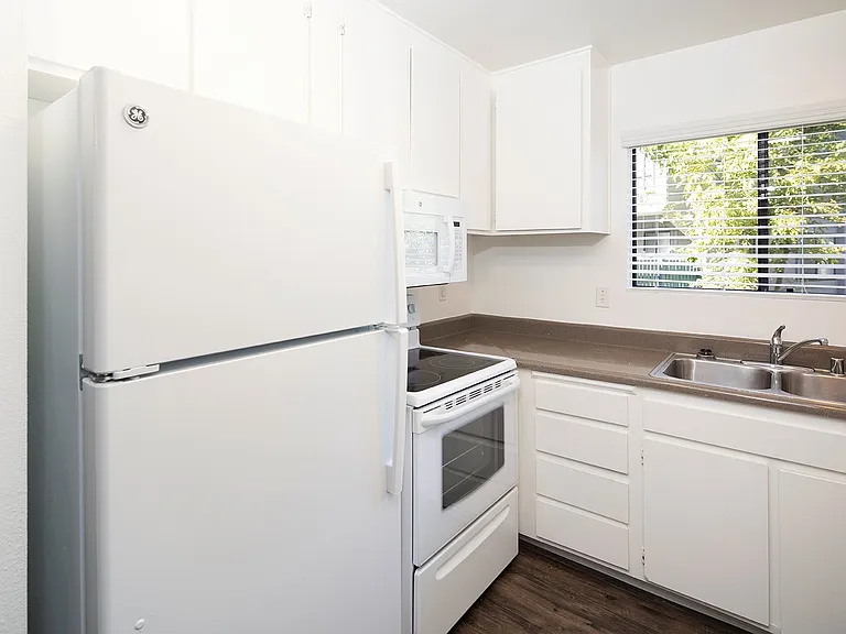 Village Apartments — Photo 7