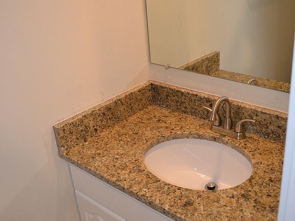 Downstairs powder room with stunning granite