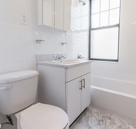 5th image of 303 W 21st St APT 14A