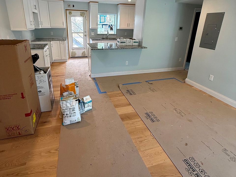 Living room & view of kitchen.