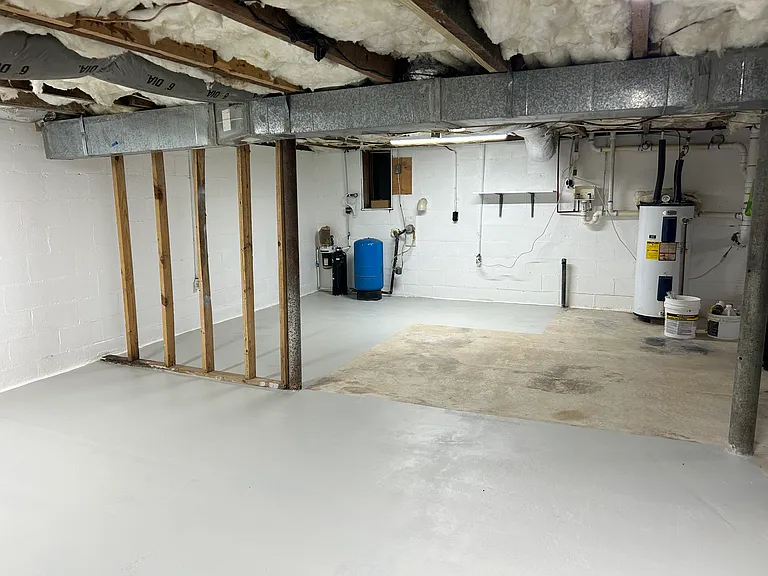 laundry hook-ups are on the far wall for washer and dryer