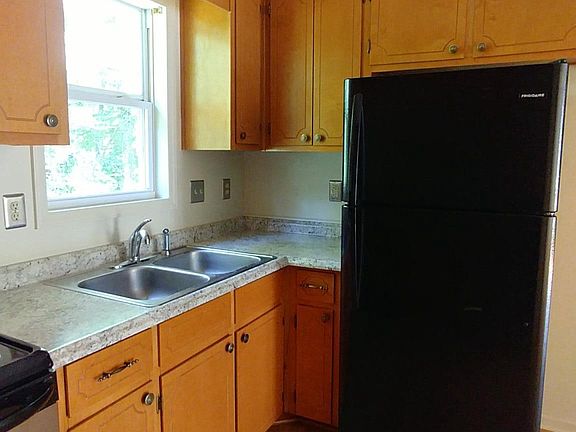 kitchen with all new counter tops and refrigerator. stove i
