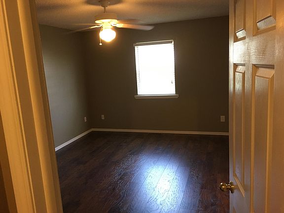 Master bedroom laminate hardwood floor, ceiling fan spacious 13 X 15