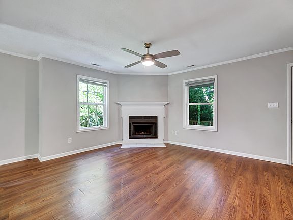 Large family room with log burning fireplace