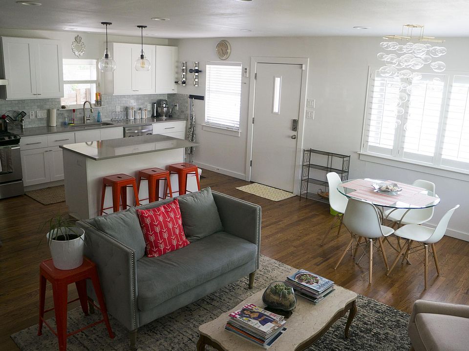 Living room/kitchen. Beautiful open kitchen is great for en