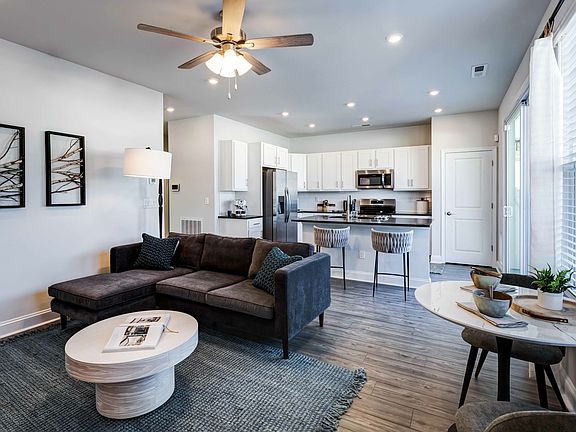 Indulge in Amavi Sherrills Ford's generous space, seamlessly combining comfort and style to create the ideal home.