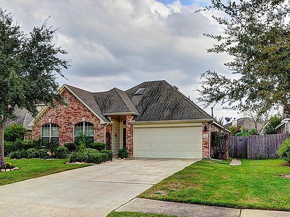 Notice the High pitch which gives this home tons of attic space, there actually two entrances in the attic.  One area has been floored so it allows you to stand up and walk around.