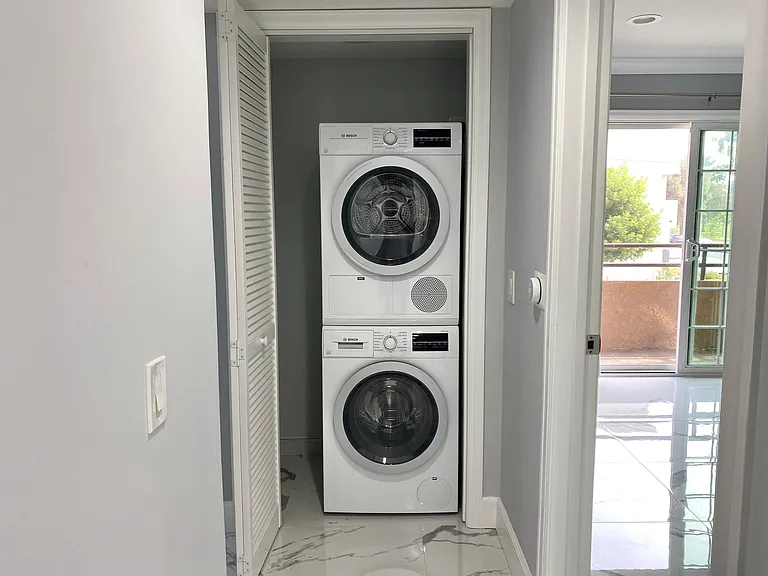 In Unit Bosch Washer And Dryer.