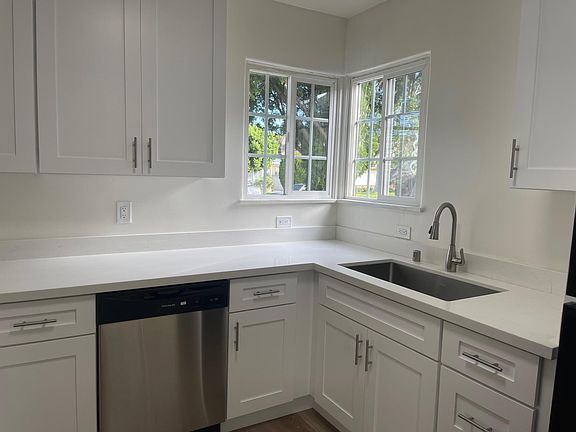 Remodeled kitchen with corner window