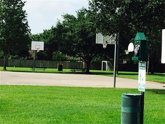 Basketball Courts at the Park in neighborhood