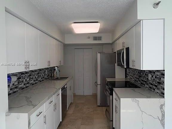 2nd image of 3530 Mystic Pointe Dr APT 405