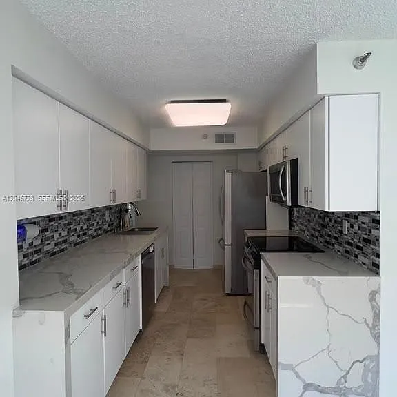 3530 Mystic Pointe Dr #405 — Photo 2