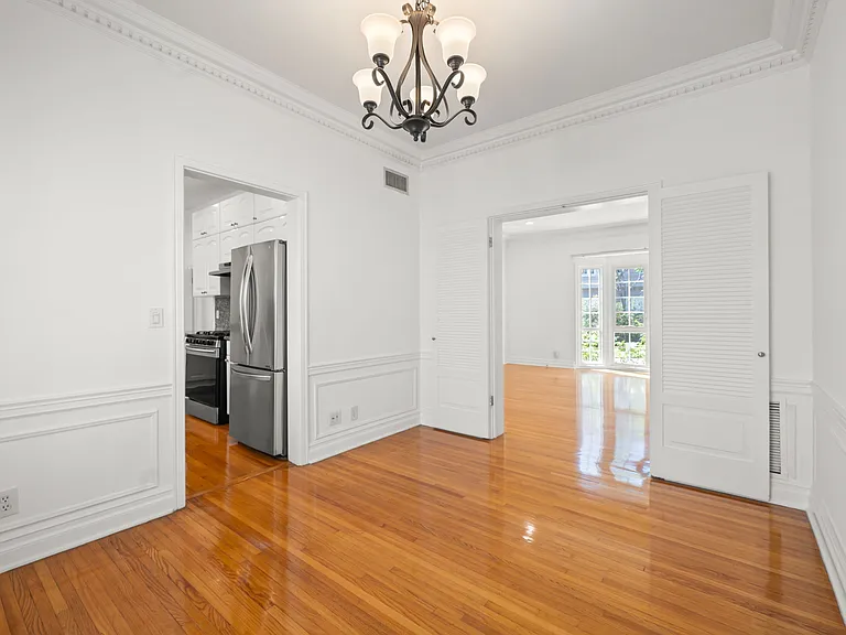DINING ROOM W. DIRECT ACCESS TO BOTH KITCHEN AND LARGE LIVING ROOM