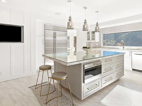 Open kitchen space for dual purpose cooking and entertaining.