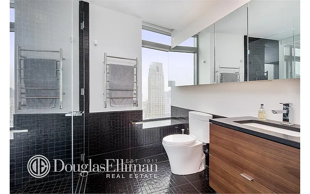 Sold by Douglas Elliman | media 13