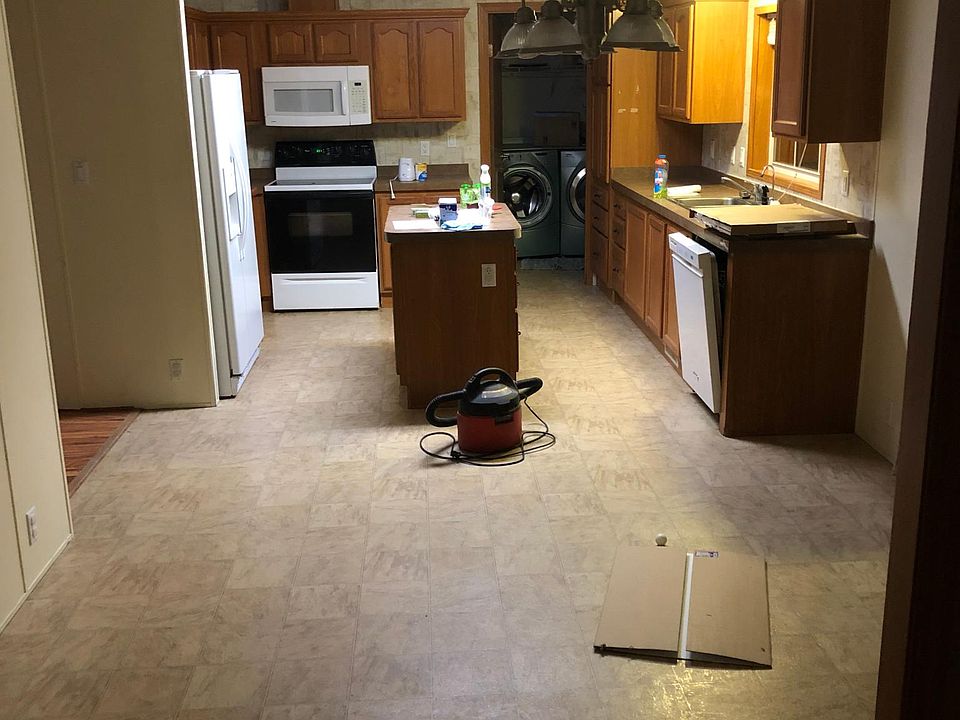 Kitchen and dining room w/attached laundry.