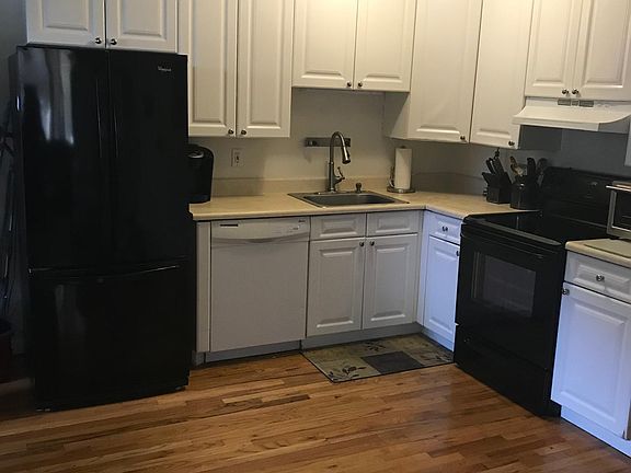 Kitchen is open to the large living room area.