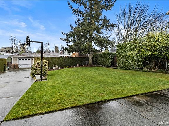 Fenced and landscaped yard is perfect for large or small gatherings.