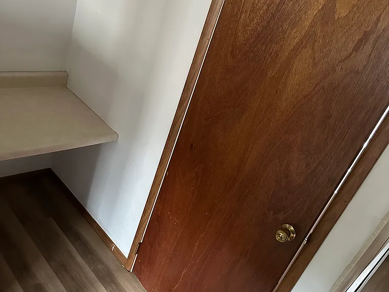 bathroom door/table in kitchen